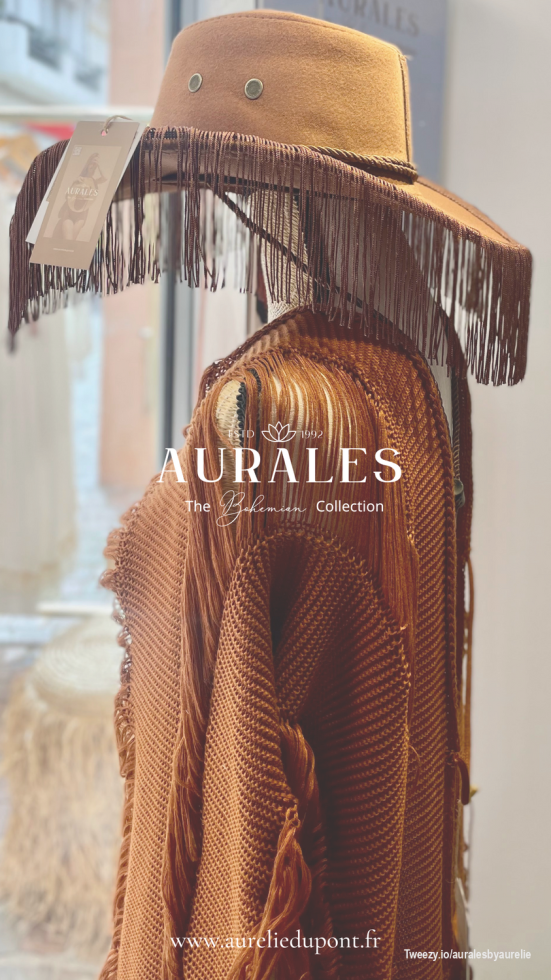 <div class="border-borderMain/50 ring-borderMain/50 divide-borderMain/50 dark:divide-borderMainDark/50 dark:ring-borderMainDark/50 dark:border-borderMainDark/50 bg-transparent">
<div class="gap-y-sm md:gap-y-md flex flex-col">
<div class="relative font-sans text-base text-textMain dark:text-textMainDark selection:bg-super/50 selection:text-textMain dark:selection:bg-superDuper/10 dark:selection:text-superDark">
<div class="min-w-0 break-words [word-break:break-word]">
<div id="markdown-content-87" class="gap-y-md after:clear-both after:block after:content-['']" dir="auto">
<div class="my-2 first:mt-0 [&amp;:has([data-inline-type=image])+&amp;:has([data-inline-type=image])_[data-inline-type=image]]:hidden [&amp;:has(table)_[data-inline-type=image]]:hidden">
<div class="relative">
<div class="prose text-pretty dark:prose-invert inline leading-normal break-words min-w-0 [word-break:break-word]">
<p class="my-0">Complete your boho look with <strong>the fringed hat and poncho set</strong> from Aurales. Combining style and comfort, this duo adds a polished touch to casual outfits, perfect for standing out on any occasion.</p>
</div>
</div>
</div>
</div>
</div>
</div>
<div class="flex items-center justify-between">
<div class="-ml-sm gap-xs flex items-center">
<div class="flex items-center min-w-0 font-medium gap-1.5 justify-center">
<div class="flex shrink-0 items-center justify-center size-4">&nbsp;</div>
<div class="text-align-center relative truncate leading-loose -mb-px">&nbsp;</div>
</div>
</div>
<div class="gap-x-xs flex items-center">
<div class="gap-xs flex items-center border-borderMain/50 ring-borderMain/50 divide-borderMain/50 dark:divide-borderMainDark/50 dark:ring-borderMainDark/50 dark:border-borderMainDark/50 bg-transparent">
<div class="flex items-center min-w-0 font-medium gap-1.5 justify-center">
<div class="flex shrink-0 items-center justify-center size-4">&nbsp;</div>
</div>
<div class="flex items-center min-w-0 font-medium gap-1.5 justify-center">
<div class="flex shrink-0 items-center justify-center size-4">&nbsp;</div>
</div>
</div>
<div class="flex items-center min-w-0 font-medium gap-1.5 justify-center">
<div class="flex shrink-0 items-center justify-center size-4">&nbsp;</div>
</div>
<div class="">
<div class="flex items-center min-w-0 font-medium gap-1.5 justify-center">
<div class="flex shrink-0 items-center justify-center size-4">&nbsp;</div>
</div>
</div>
</div>
</div>
</div>
</div>
<div class="">
<div class="animate-in fade-in duration-100 ease-out border-borderMain/50 ring-borderMain/50 divide-borderMain/50 dark:divide-borderMainDark/50 dark:ring-borderMainDark/50 dark:border-borderMainDark/50 bg-transparent">
<div class="border-borderMain/50 ring-borderMain/50 divide-borderMain/50 dark:divide-borderMainDark/50 dark:ring-borderMainDark/50 dark:border-borderMainDark/50 bg-transparent">
<div class="flex items-center justify-between border-borderMain/50 ring-borderMain/50 divide-borderMain/50 dark:divide-borderMainDark/50 dark:ring-borderMainDark/50 dark:border-borderMainDark/50 bg-background dark:bg-backgroundDark">
<div class="flex w-full items-center justify-between mb-sm">
<div class="">
<div class="space-x-sm flex items-center">
<div class="font-display text-lg font-medium text-textMain dark:text-textMainDark selection:bg-super/50 selection:text-textMain dark:selection:bg-superDuper/10 dark:selection:text-superDark">
<div class="w-[24px]">&nbsp;</div>
</div>
</div>
</div>
</div>
</div>
</div>
</div>
</div>