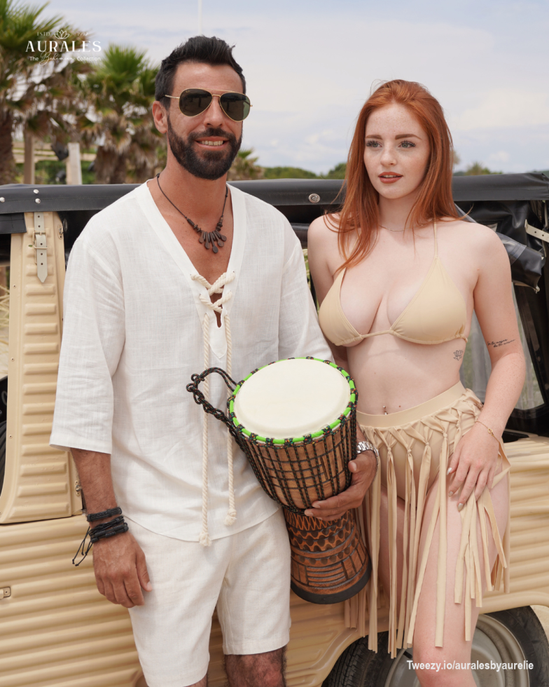 <p>From the <em>Aurales Bohemian Collection. </em>He wears a lightweight, linen tunic with a rope tie detail and matching shorts. Her look is grounded in soft, neutral tones with a sleek bikini and fringed skirt, bringing a playful yet elegant edge to beach days and beyond. Endless summer with <strong>a bohemian flair</strong>, ready for rhythm-filled moments by the sea.</p>